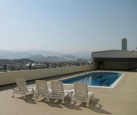 take an affordable break by the seaside city at the emirate springs hotel apartments, fujairah | heated rooftop swimming pool