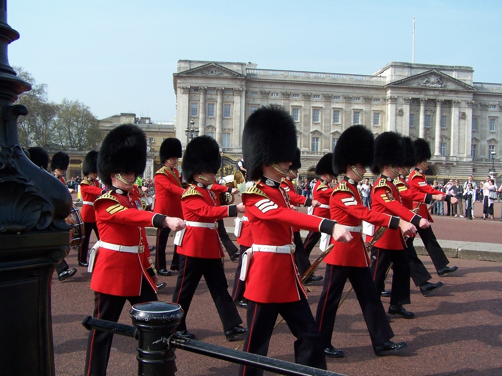 enjoy the winter at the beautiful buckingham palace, london | changing of the guard at buckingham palace