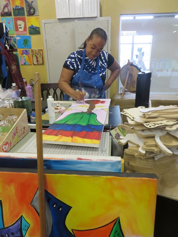 Artist at work at Lowe Mill ARTS and Entertainment