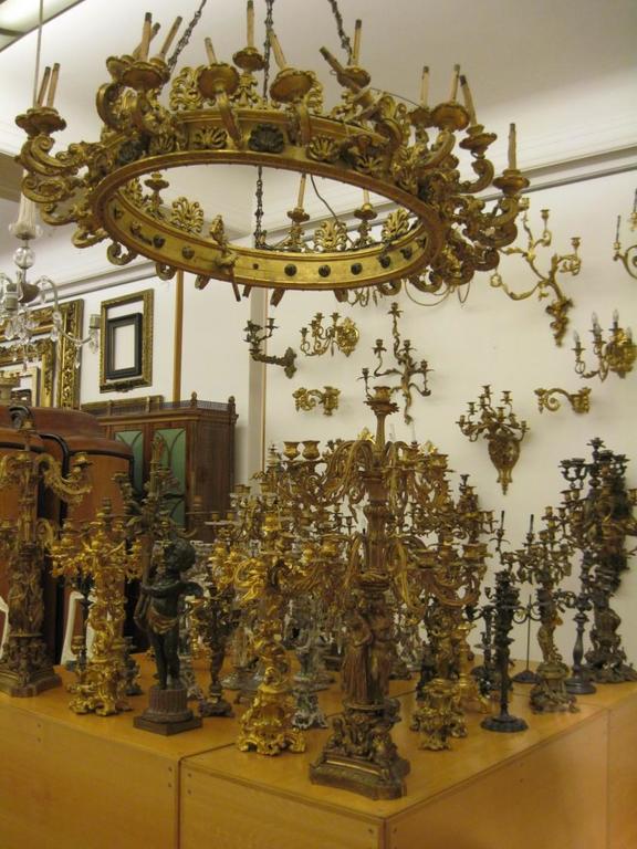 Part of the collection of candlesticks and chandeliers.