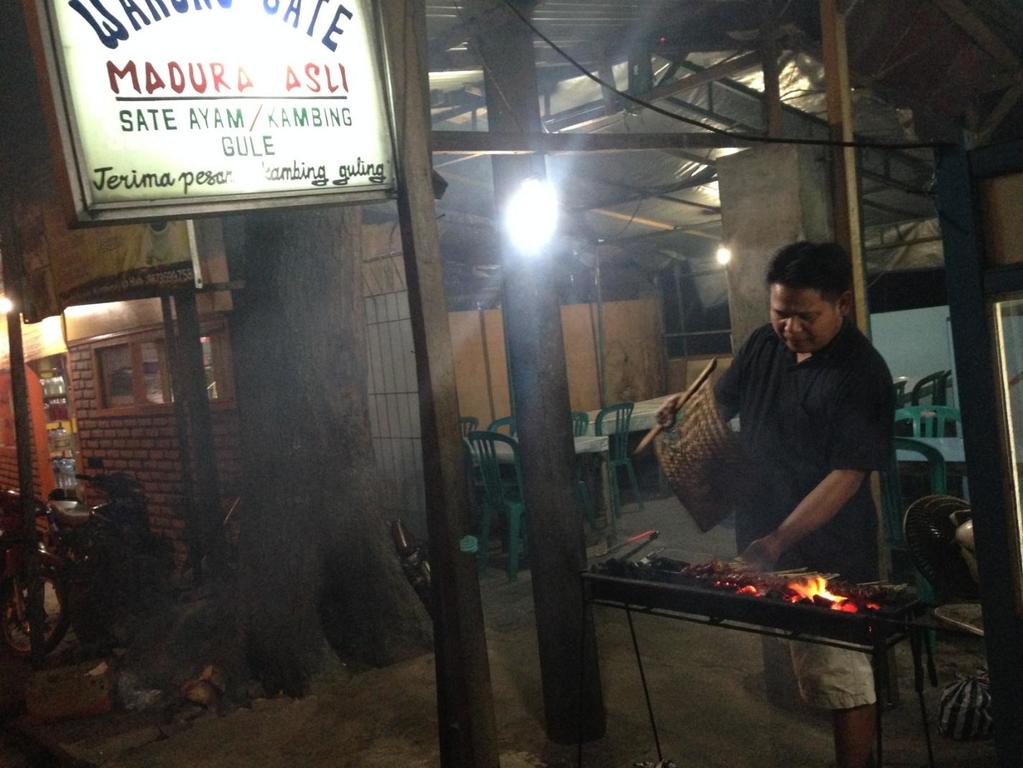 Someone selling satay in front of Foresta Resort.