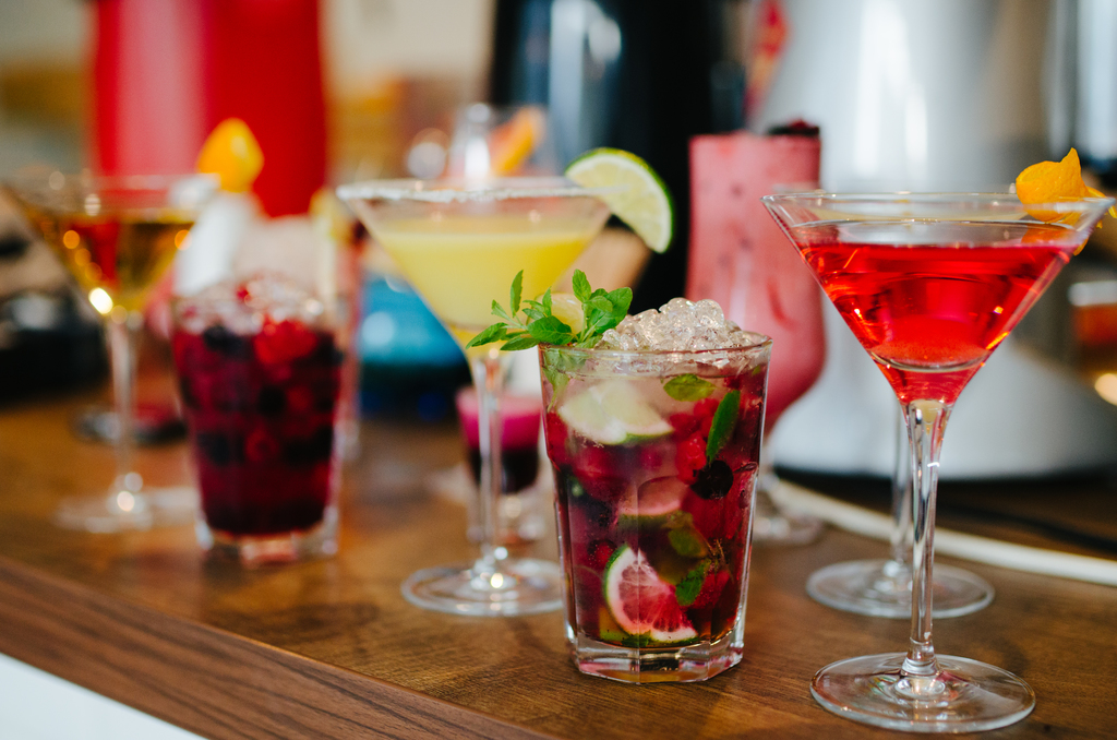 Various cocktails on the counter.