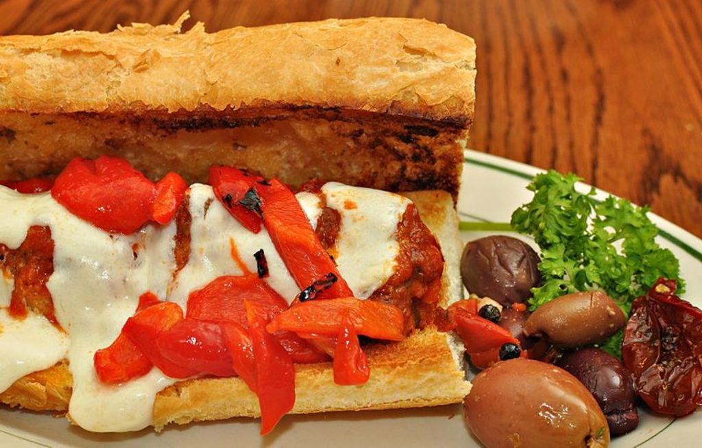 Meatball sub with marinara sauce, mozzarella, and roasted peppers