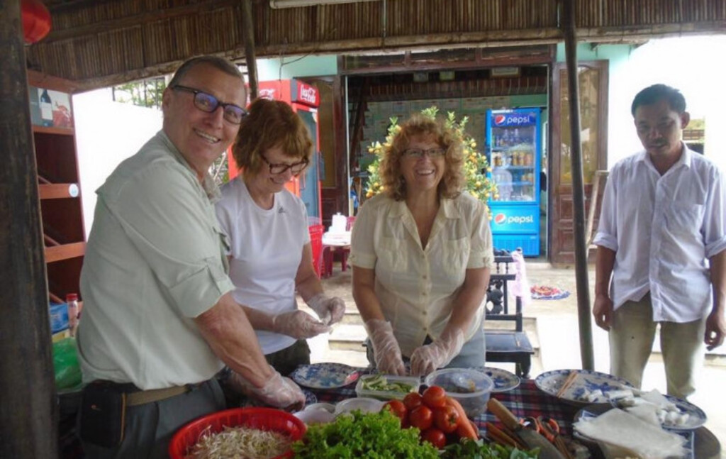 cook with a local and visit the market by boat
