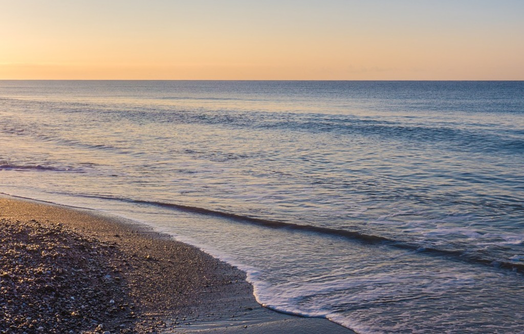 Dawn at the beach in Marbella, Spain