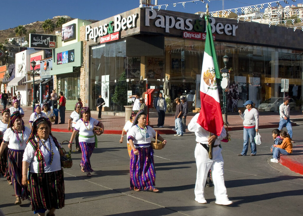 women passing Papas and Beer