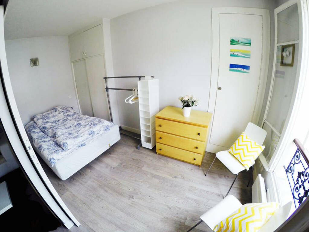 A brightly-lit bedroom