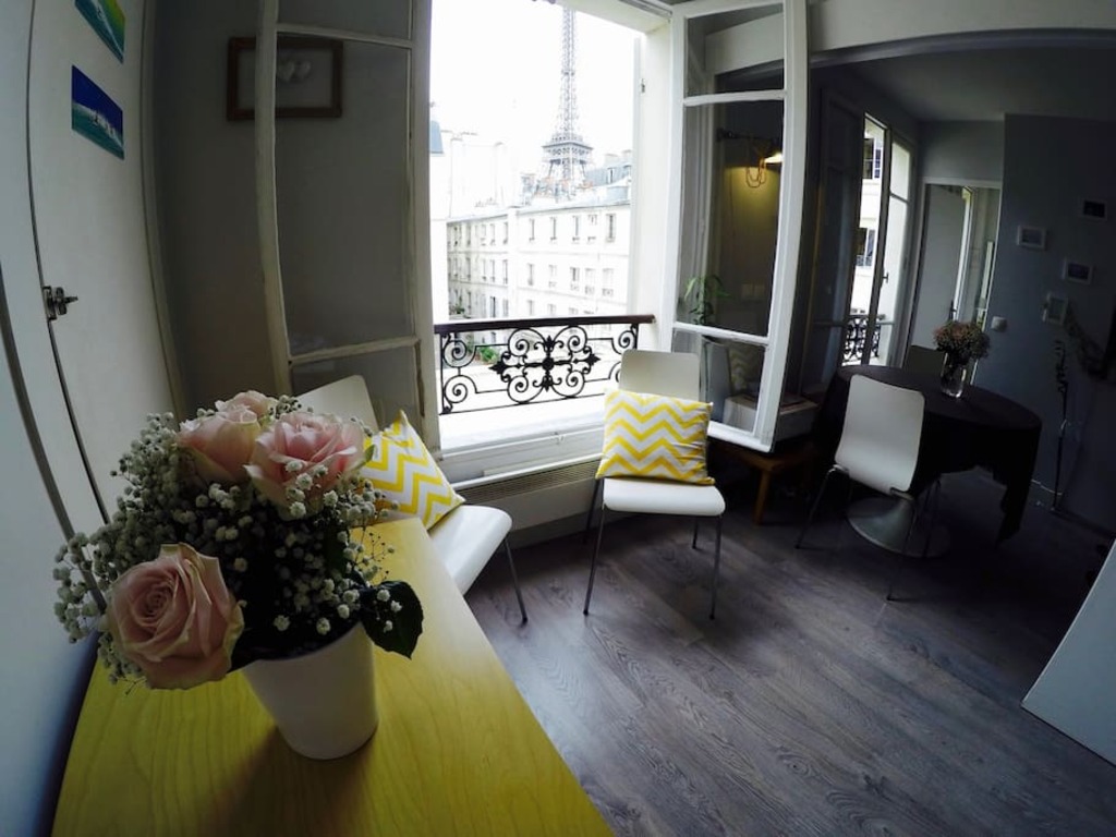 The Eiffel Tower lurking in the distance from the bedroom