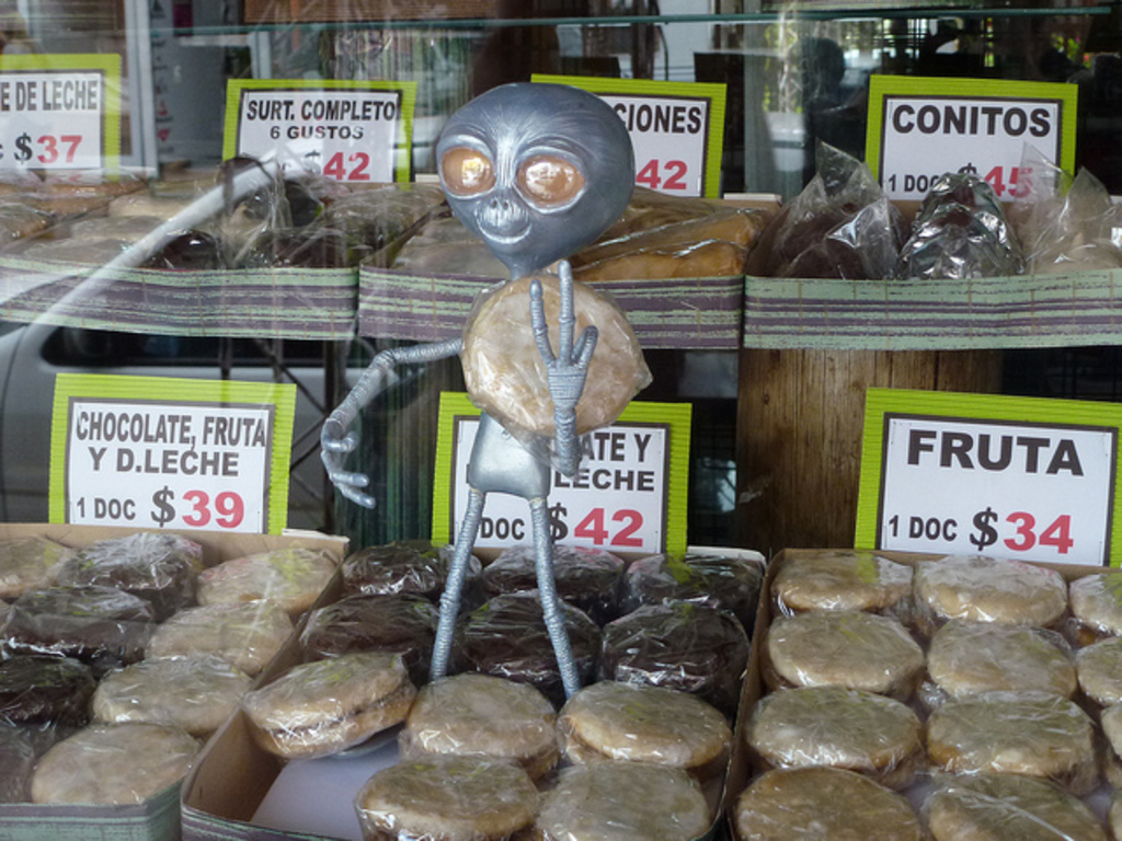 Alien offering alfajores for sale in Capilla del Monte, Argentina