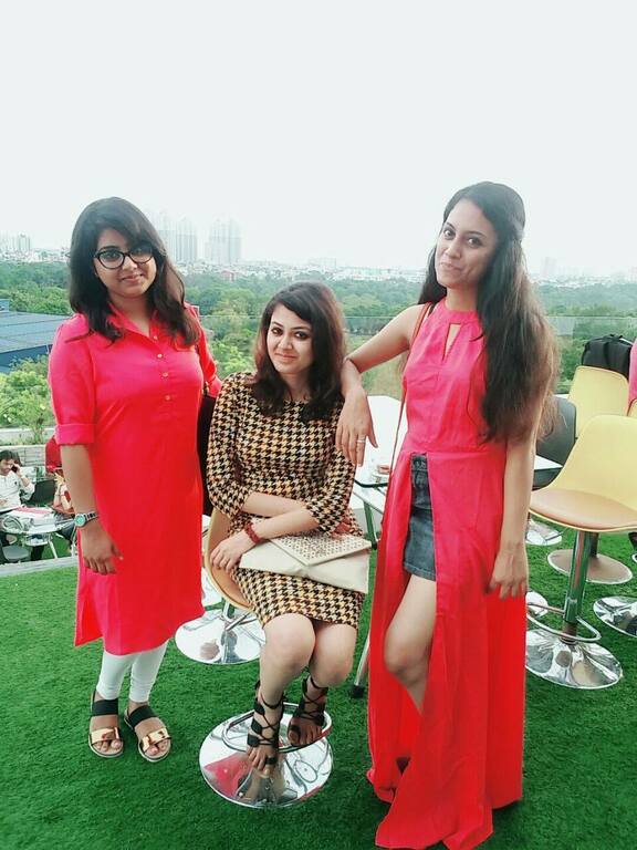 Posing against the backdrop of the city skyline