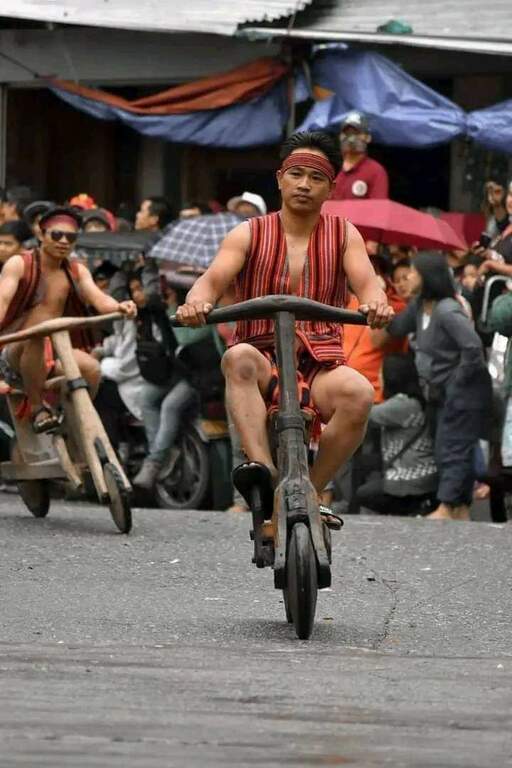 Banaue locals on wooden bikes