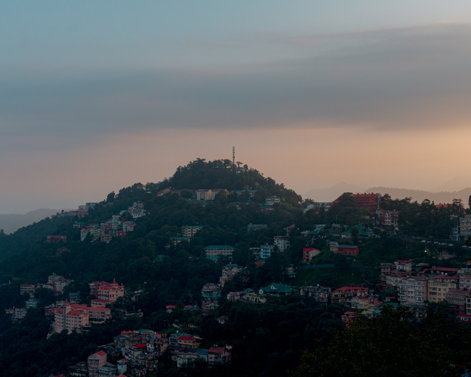 The view from the ridge of the houses of its hills