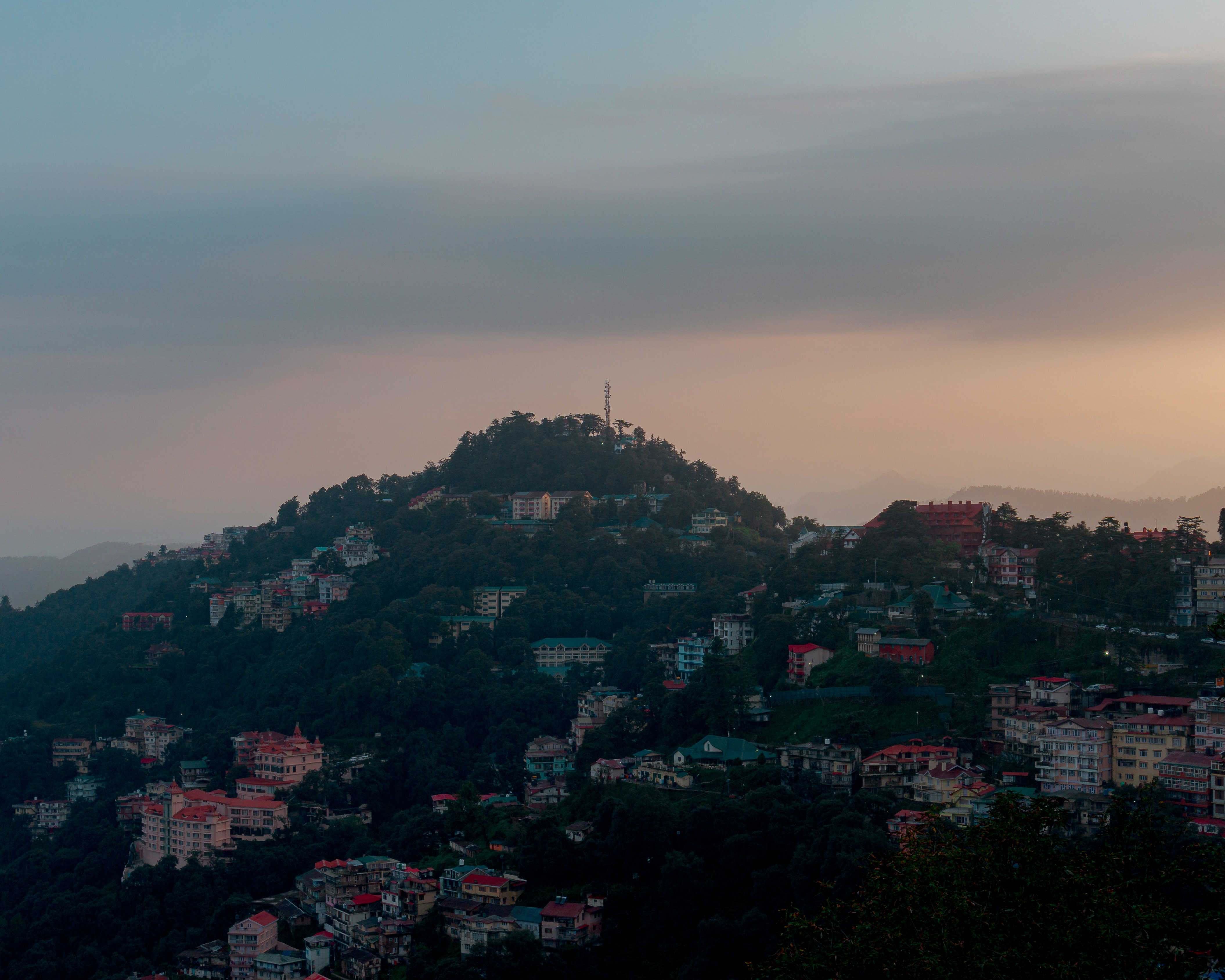 The view from the ridge of the houses of its hills