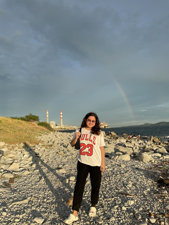 A rare photo of me in Sisiman Bay. Say hello to the rainbow!