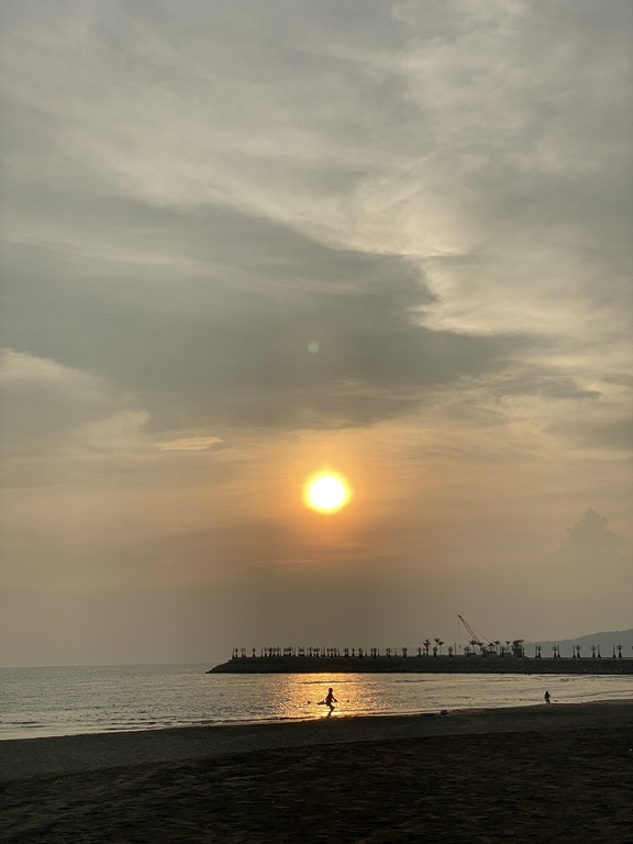 A photo of the beach during sunset