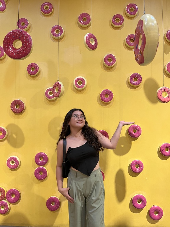 A photo of me with the doughnuts