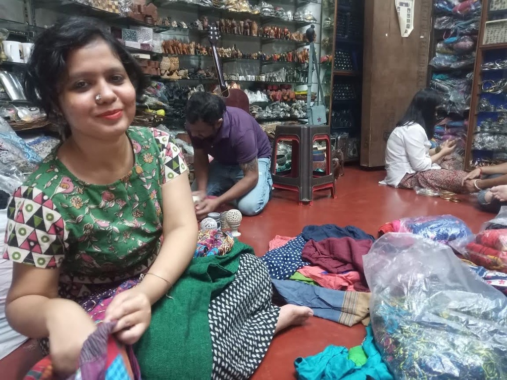 Me, surrounded by clothes at Sunshine