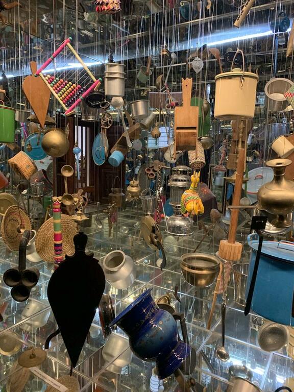 An installation featuring household items at the museum