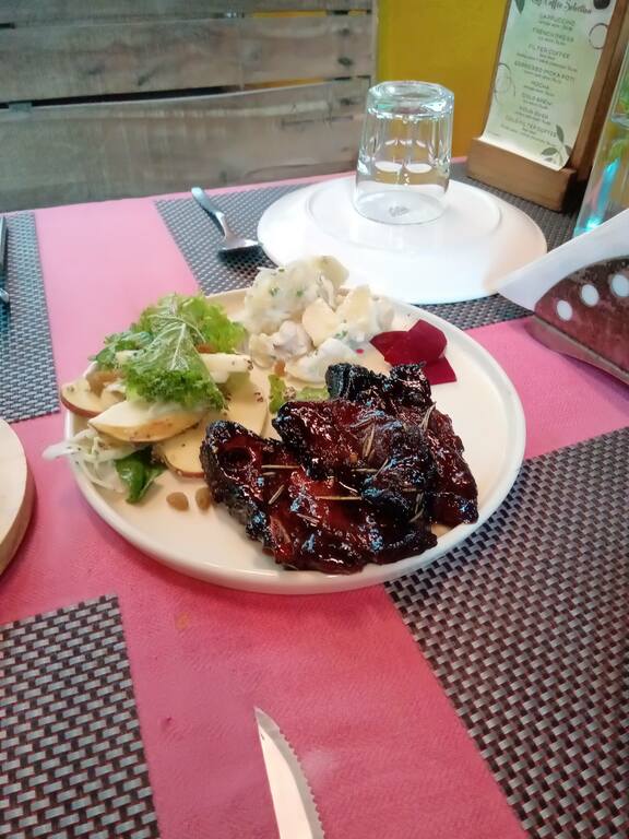 Pork chops with salad at The Farm