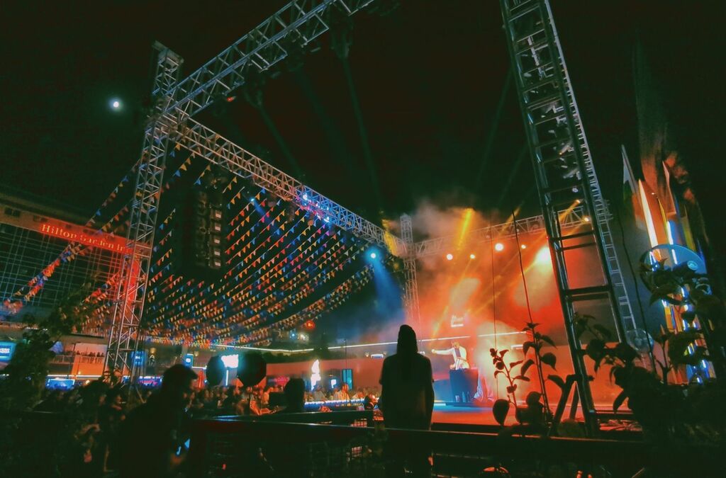 Concert at DLF Ave. with Hilton Garden Inn in the background