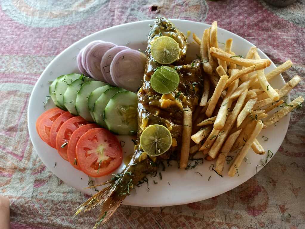 Grilled fish with garlic sauce