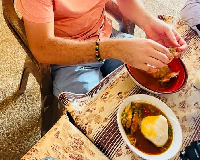 Banku and Okro soup with crab , beef, and fish