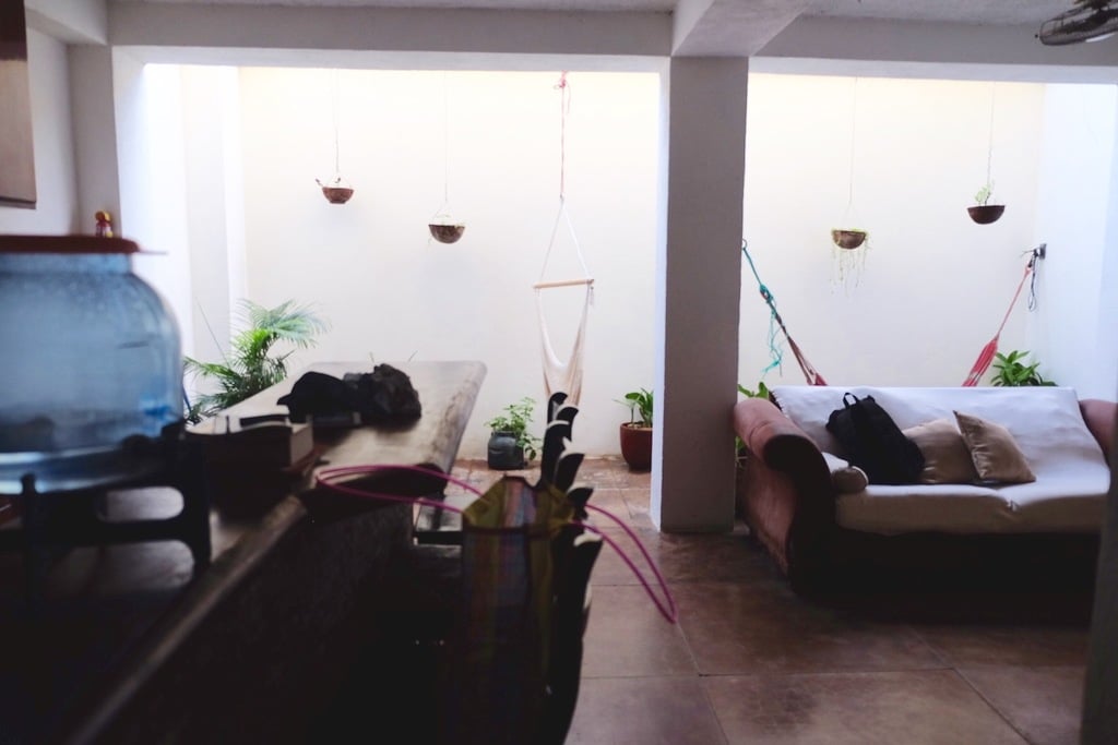 vacation apartments in san juan del sur | enjoy the open-air living space & garden area inside