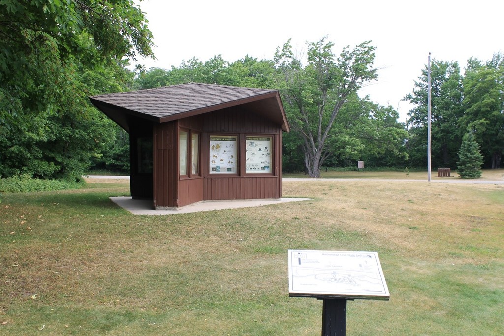 An educational kiosk by the park office.