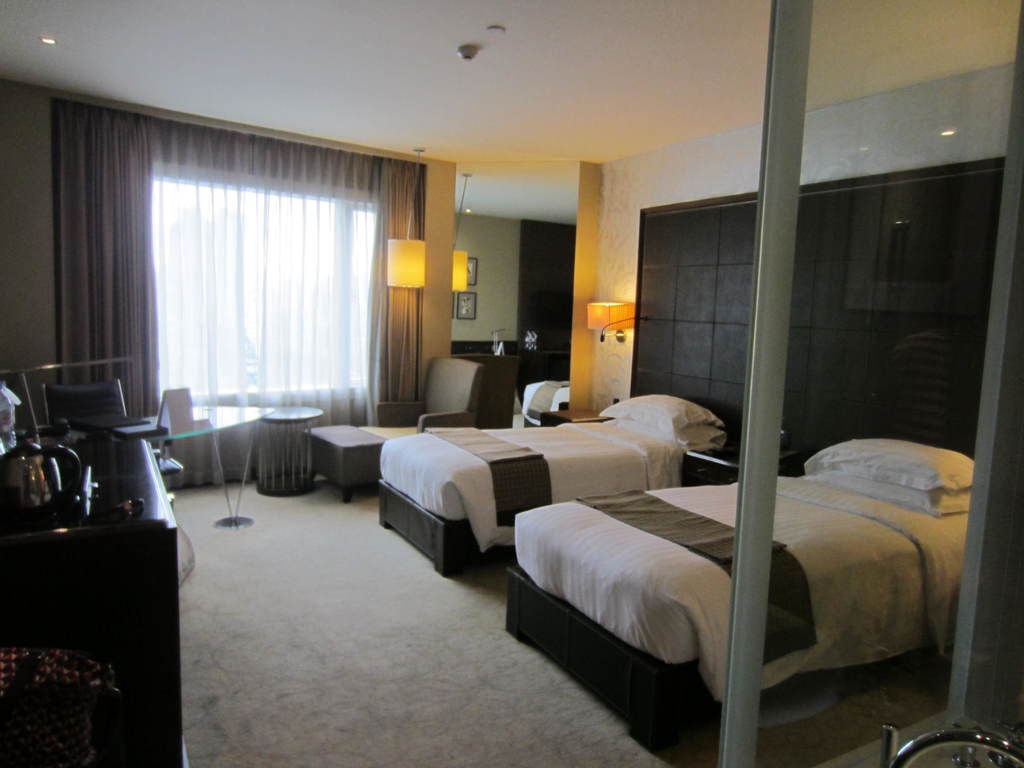 hotels in bangkok pullman bangkok grande sukhumvit | modern and spacious hotel room with thoughtful furnishings