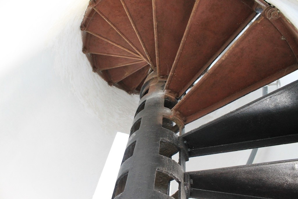 The tower’s stairs spiraling upward.