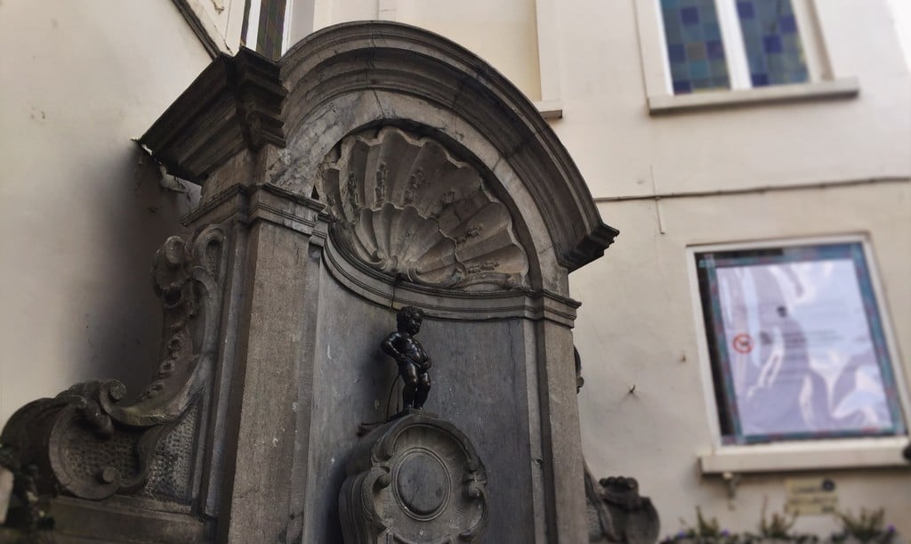 attractions in brussels region manneken pis | the manneken pis: a kid dressed in many costumes