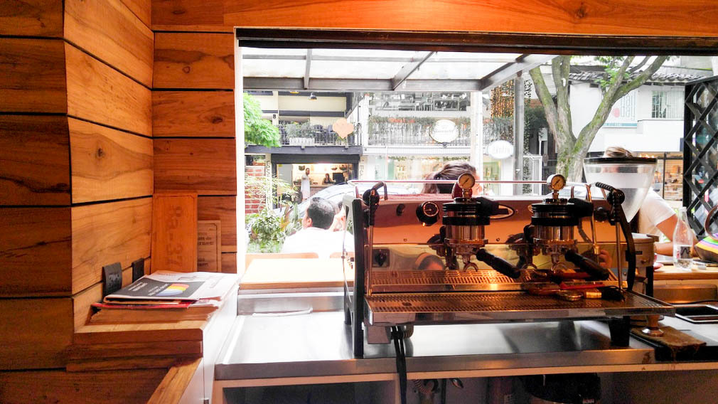 things to do in colombia | wait out the rain storms in this cozy cafe