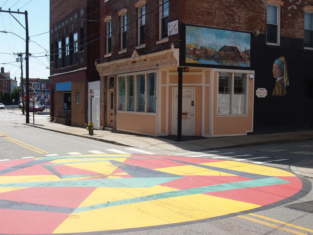Several pieces of street art in one view