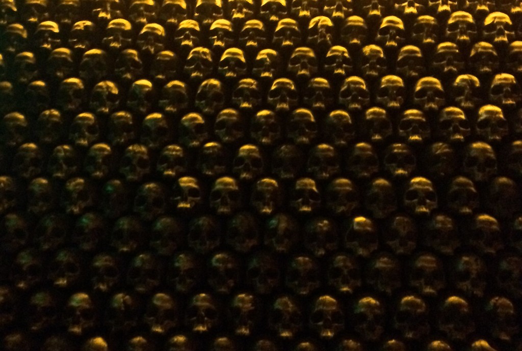 A close-up of the wall of brass skulls, just one facet of the unusual decor of the speakeasy. 