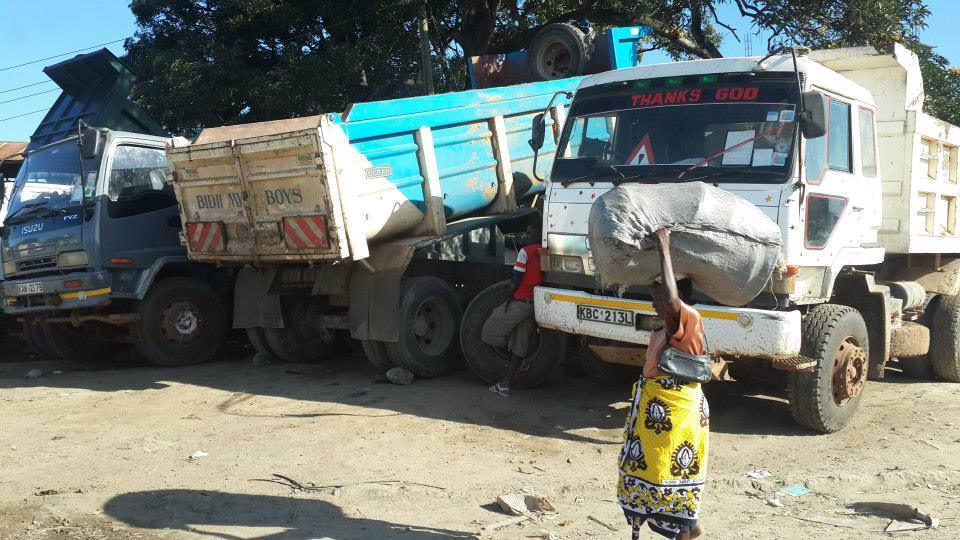 guide to local history in mombasa | watch people work with symbolic signs in the background