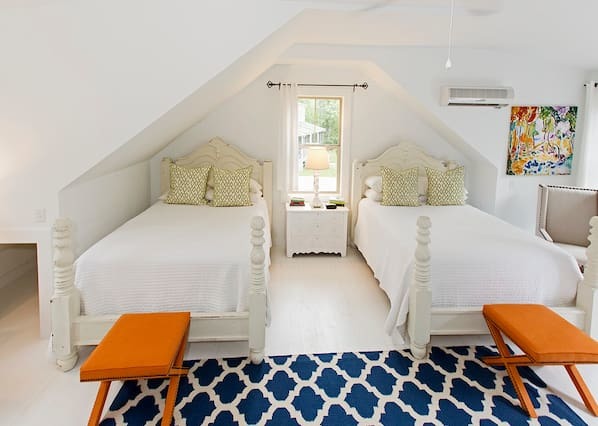 bright and airy suite with a balcony