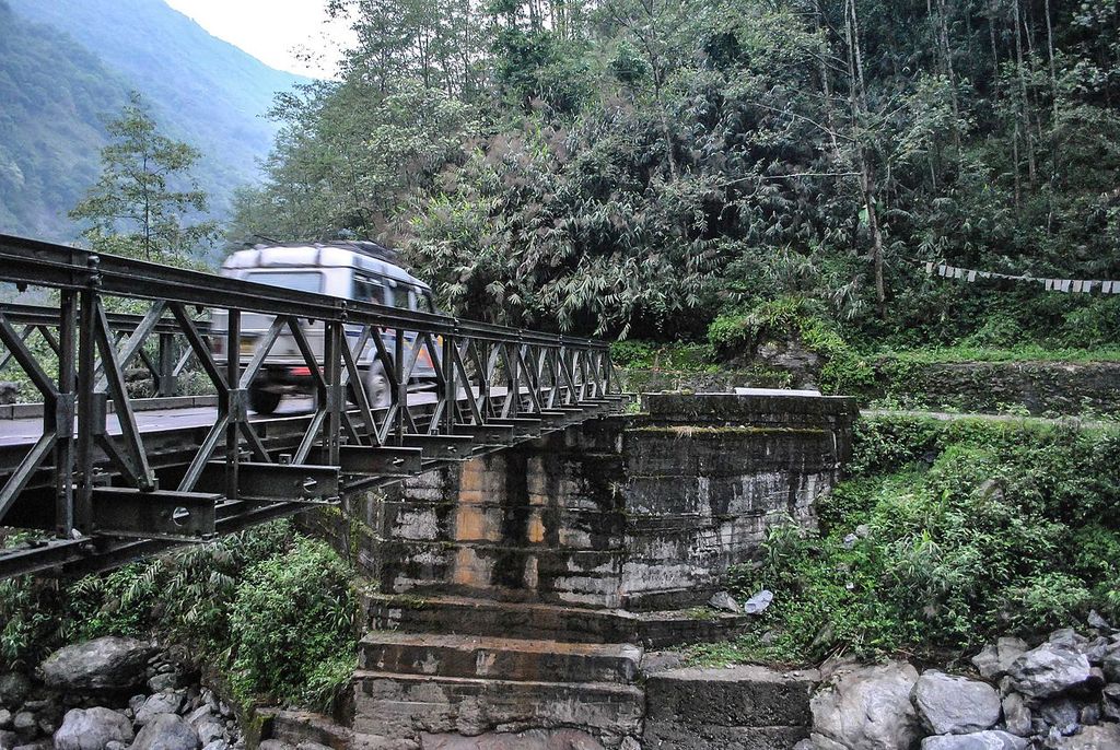 Vehicle crossing Iron Bridge on the way to Lachen,North Skkim