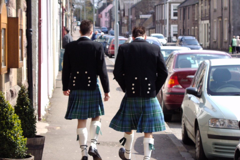Men in kilts. Callander. Even young men wear kilts in Callander in the Trossachs Scotland.