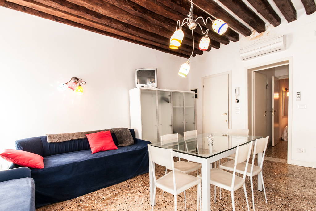 Living and dining area of Modern Apartment beside Rialto Bridge