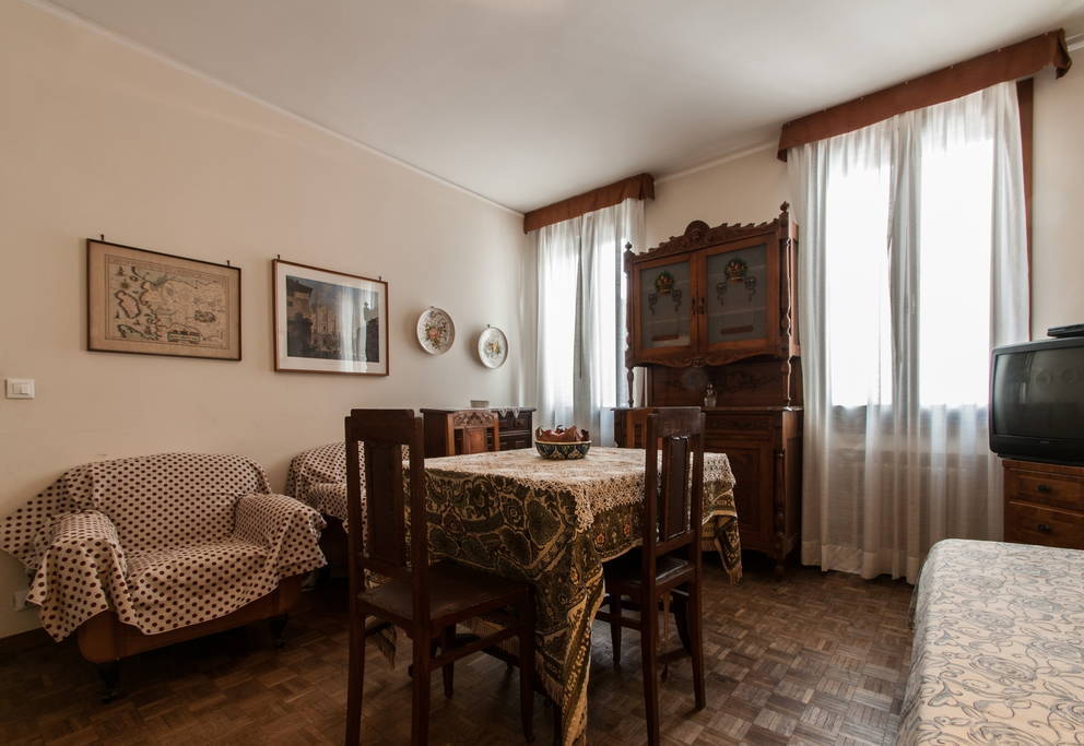 Living and dining area of Typical Venetian Apartment