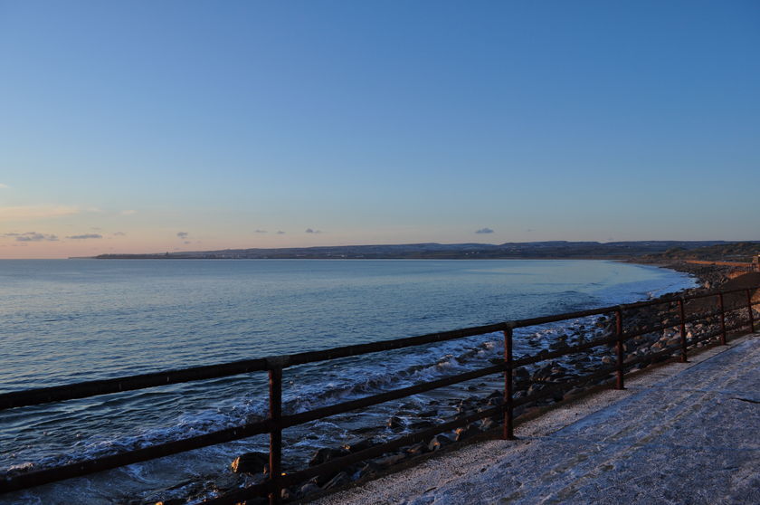 Lahinch beach Ireland during winter sunset__840x840