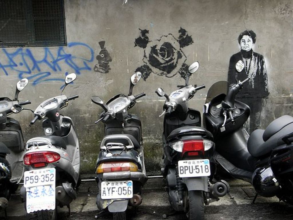 Scooters parked in ShiDa Night Market