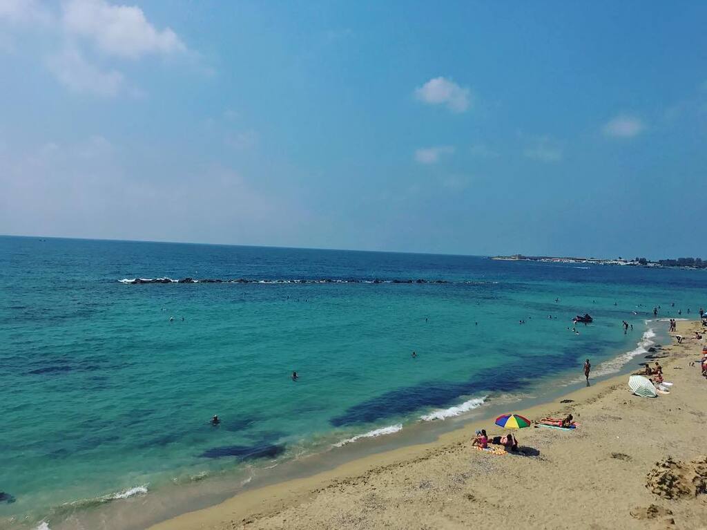 things to do in paphos cyprus | sunbathe at the paphos municipal beach
