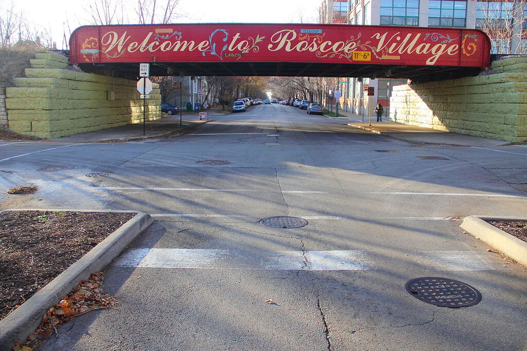 New "Welcome to Roscoe Village" Painted Sign on Roscoe at the Train Tracks