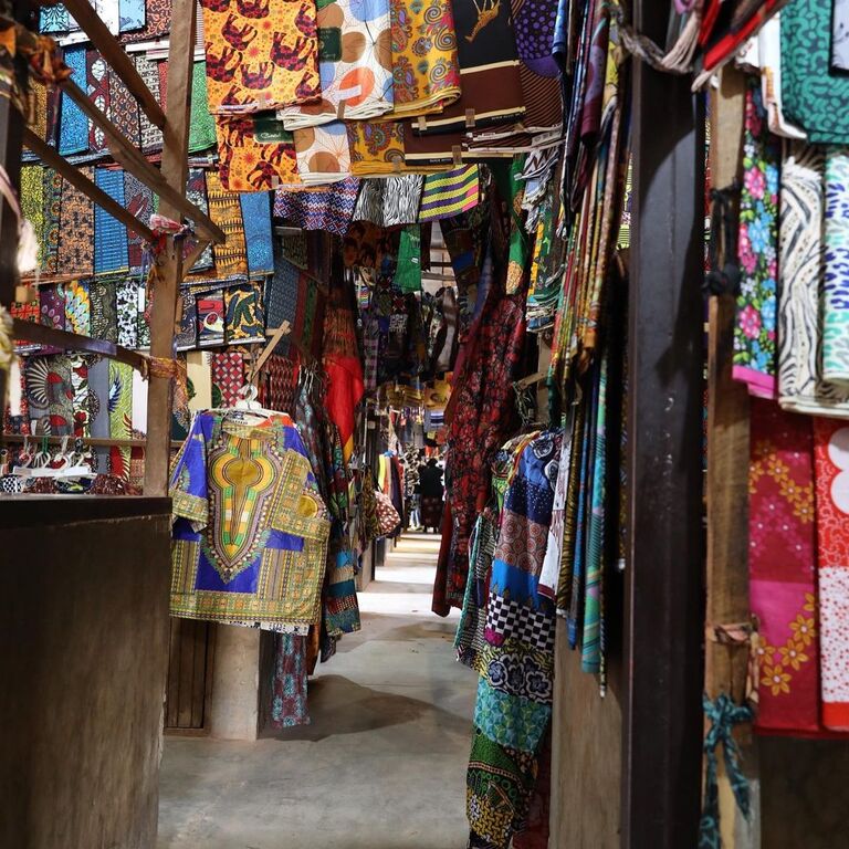 things to do in kigali rwanda | buy some colorful garments at kimironko market
