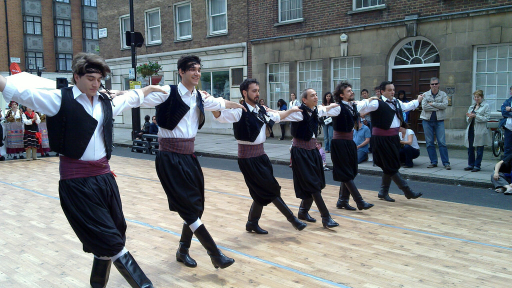 Greek Men Dancing in a Row