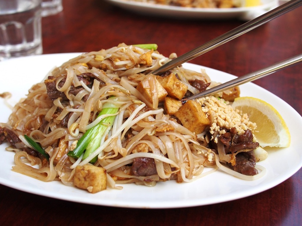 Fried noodles and chicken with vegetables is always a yummy meal