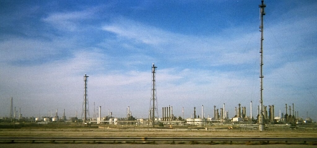 Kuwait oil field as seen from shuttle bus on street, Kuwait City