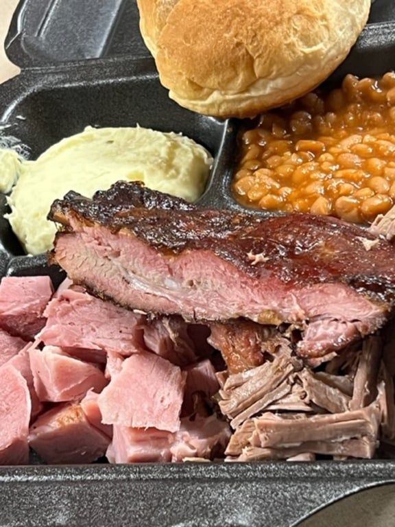 Smoked meats and homemade bun at Grayson's