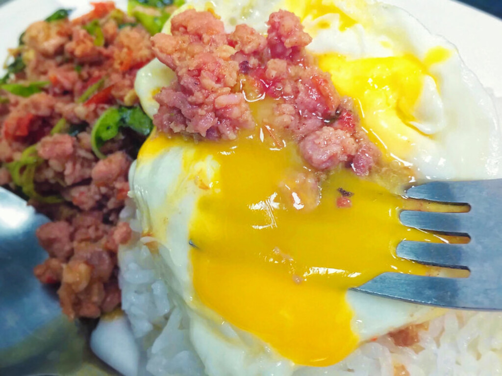 Runny Egg Over Pad Kra Prao (Stir-Fried Thai Basil Pork) from Kanokwan Restaurant in Taipei